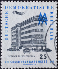 GERMANY, DDR - CIRCA 1961 : a postage stamp from Germany, GDR showing the building of the Leipzig...