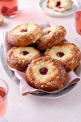 Brioche buns with cottage cheese and jam.