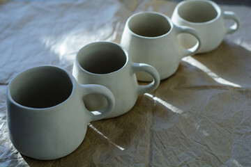 Obraz na płótnie Canvas Handmade ceramic craft ware. Cups.