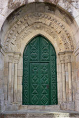 Fototapeta na wymiar green colored door of a church in Galicia