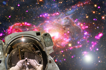 Obraz na płótnie Canvas Astronaut against deep space. The elements of this image furnished by NASA.