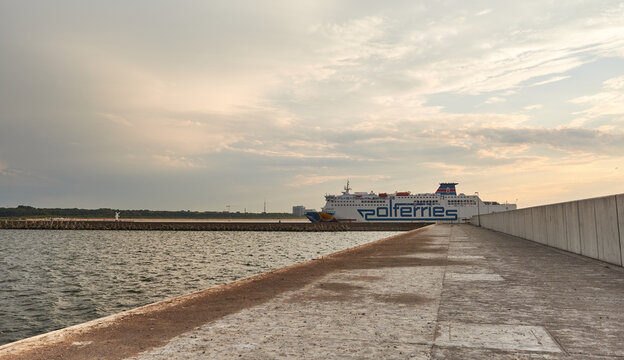 Swinoujscie, Poland - August 21, 2020: Polferries Ferry Enters Port Of Swinoujscie At Sunset.