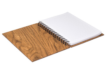 Opened notepad with white pages and a wooden brown box-spring cover, lies on a white isolated background. Side view