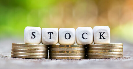 Money coins with text. Stock exchange market, trading concept.