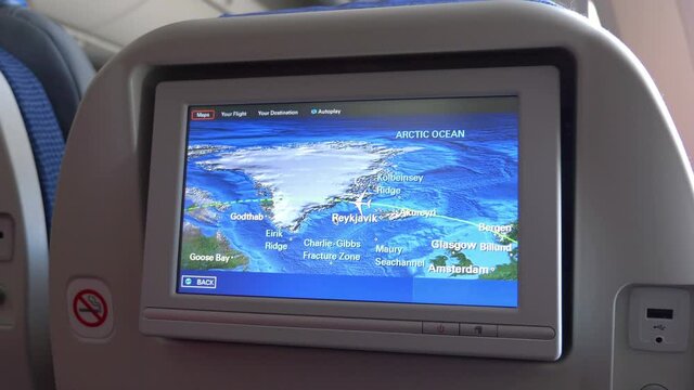 LCD monitor showing a map in the airplane in 4K slow motion 60fps