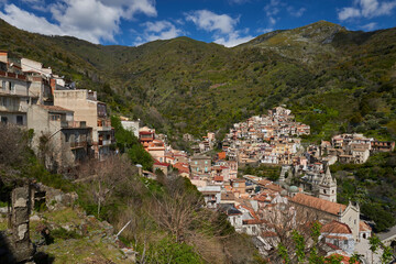 Fototapeta na wymiar small town in eastern Sicily located between the Peloritani mountains on the east coast, between green valleys and the Ionian sea of the Strait of Messina
