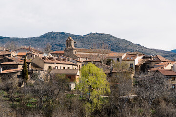 Fototapeta na wymiar Scenic panoramic view of the village of Horcajuelo de la Sierra in Madrid during springtime