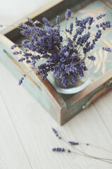 Bunch of lavender flowers, dried lavender bunches on dark wooden table