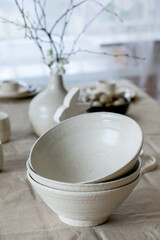 Set of empty craft white ceramic bowls