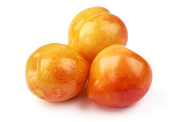 Sweet yellow plums, isolated on white background