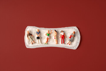 Miniature people, women of different ages and hygienic female sanitary napkin, menstrual cycle...