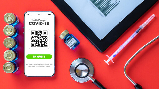 Immune passport. Coronavirus immunity certificate or vaccine passport on smartphone screen with doctor stethoscope, healthcare charts, syringe and medical equipment on hospital red background. - Powered by Adobe