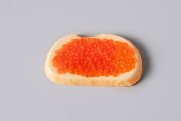 Soap in the form of a sandwich with red caviar