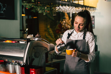 waitress preparing espresso coffee in cafeteria