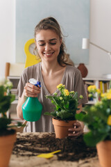 woman gardening houseplants at her home