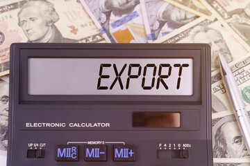 On the table are dollars and a calculator on the electronic board which says EXPORT