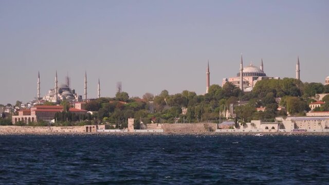 Old and new Istanbul view, view from ferry boat, awesome overbuilt coastline with mosques.