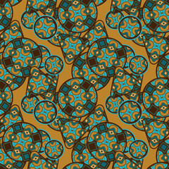 Seamless pattern with randomly placed ornamented shapes. Yellow-blue color palette. Vector illustration