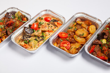Business lunch in eco plastic container ready for delivery.Top view. Office Lunch boxes with food ready to go. Food takes away. Catering, brakfast.