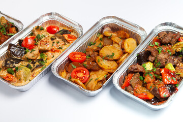 Business lunch in eco plastic container ready for delivery.Top view. Office Lunch boxes with food ready to go. Food takes away. Catering, brakfast.