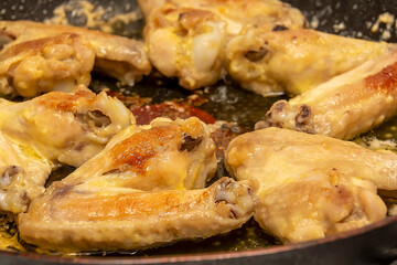 Fried chicken wings. Close-up of fried chicken wings.