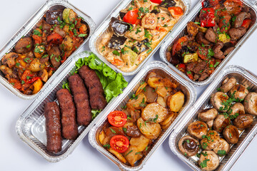 Business lunch in eco plastic container ready for delivery.Top view. Office Lunch boxes with food ready to go. Food takes away. Catering, brakfast.