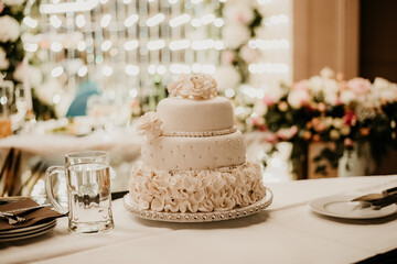 romantic wedding decoration flowers cake and champagne