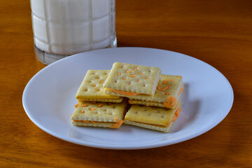cheees and cracker with a glass of milk