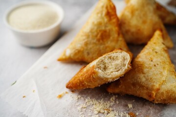 Malabar Thari Manda -Kerala deep fried snack with semlina filling, selective focus