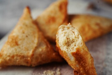 Malabar Thari Manda -Kerala deep fried snack with semlina filling, selective focus