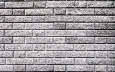 Light background of urban houce brick stone wall. texture