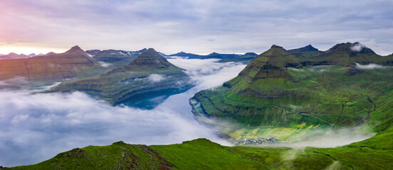 Fototapeta na wymiar Panorama over majestic sunny fjords of Funningur, Eysturoy island, Faroe Islands. Landscape photography