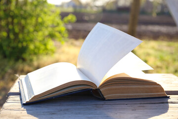The book turns over outside