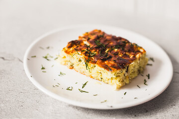 Close-up cabbage pie on a grey table