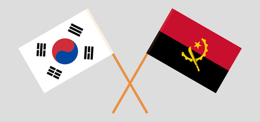 Crossed flags of South Korea and Angola. Official colors. Correct proportion