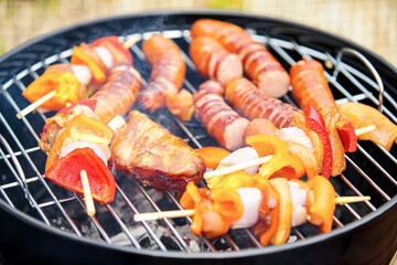 Grilling meat and sausages on a bbq
