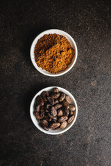 Cocoa powder and cocoa beans in bowl.