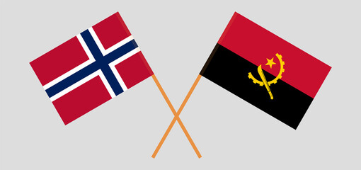 Crossed flags of Norway and Angola. Official colors. Correct proportion
