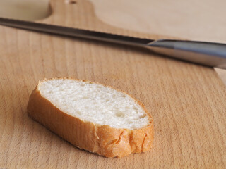 Wheat flour bread on a wooden background. side view, close up, copy space.