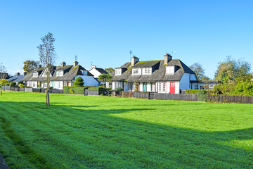 Typical and traditional houses made of adobe in Adare, Ireland