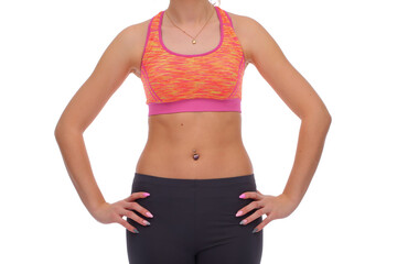 Fototapeta na wymiar Fitness trainer athletic body. Perfect belly. Ornament in the navel
