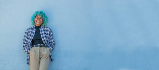 casual black afro american girl on the street wall