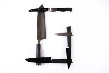 Alphabet made of knives isolated on white background. Letter 