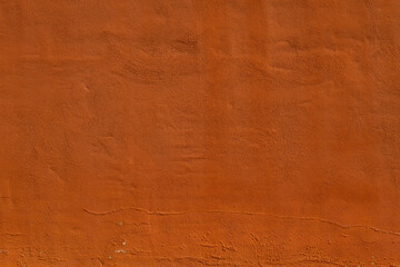 Terracotta color plastered wall