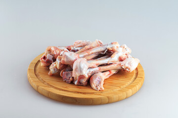  raw chicken bones on white background