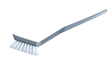 Plastic brush with white lint for washing dishes on a white isolated background.