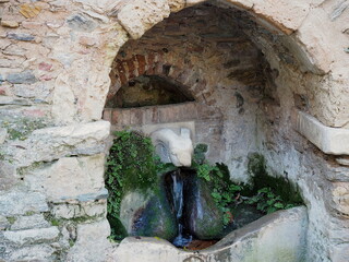 Ram's Head fountain outside Kaisariani Monastery near Athens, Greece