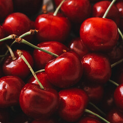 Ripe red Cherries. Pile of ripe cherries with stalks