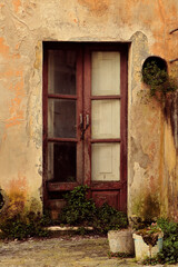 Fototapeta na wymiar Abandoned House with French Door in Calabria