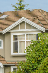 The top of the house with nice window.
